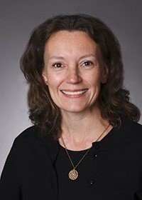 photo portrait of Kim Mooney-Doyle, Ph.D., R.N., CPNP-AC